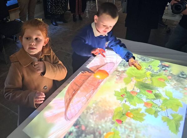 James and Katelyn from Cootehall National School, enjoying the launch in Boyle Library of ‘The Magic Table’ part of ‘The Happiness Programme’. James and Katelyn from Cootehall National School, enjoying the launch in Boyle Library of ‘The Magic Table’ part of ‘The Happiness Programme’.