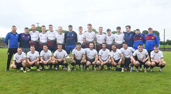 The CP Ajax junior soccer team and management celebrate the club's maiden Challenge Cup title on Sunday last. Picture: Gerard O'Loughlin The CP Ajax junior soccer team and management celebrate the club's maiden Challenge Cup title on Sunday last. Picture: Gerard O'Loughlin