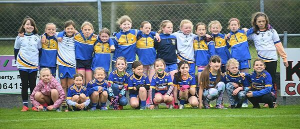 The St. Ciaran's U-8 and U-10 girls' football teams that made light of the bad weather to play in an exhibition game at half time during their club's senior ladies' football championship quarter-final against St. Dominic's in Mulhern Park, Fuerty. Picture: Gerard O'Loughlin The St. Ciaran's U-8 and U-10 girls' football teams that made light of the bad weather to play in an exhibition game at half time during their club's senior ladies' football championship quarter-final against St. Dominic's in Mulhern Park, Fuerty. Picture: Gerard O'Loughlin