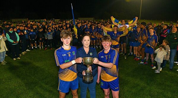Clann na nGael U-16 joint captains, Bobby Lenehan and Luke Dunning, accept the Division One Cup from Roscommon Minor Board Vice-Chairperson, Paula Clogher, following their side's victory against St. Brigid's in the recent final at Woodmount. Picture: Gerard O'Loughlin Clann na nGael U-16 joint captains, Bobby Lenehan and Luke Dunning, accept the Division One Cup from Roscommon Minor Board Vice-Chairperson, Paula Clogher, following their side's victory against St. Brigid's in the recent final at Woodmount. Picture: Gerard O'Loughlin