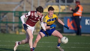 <p>Galway midfielder Oisín Ó Neachtain and his Roscommon counterpart, Seamie Carthy, challenge for possession during Friday evening's provincial minor football championship contest at King and Moffatt Dr. Hyde Park. Picture: Gerard O'Loughlin</p> <p>Galway midfielder Oisín Ó Neachtain and his Roscommon counterpart, Seamie Carthy, challenge for possession during Friday evening's provincial minor football championship contest at King and Moffatt Dr. Hyde Park. Picture: Gerard O'Loughlin</p>