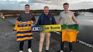 <p>John Mee, Club Rossie International Liaison, presents jerseys to Garry Galvin and Ryan Donoghue, who are both originally from Tulsk. </p> <p>John Mee, Club Rossie International Liaison, presents jerseys to Garry Galvin and Ryan Donoghue, who are both originally from Tulsk. </p>