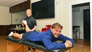 <p>Pádraig Pearses defender Mark Richardson gets some physio from Jenny Downey before training ahead of their side's county senior football championship final against St. Brigid's at King and Moffatt Dr. Hyde Park on Sunday. Picture: Gerard O'Loughlin </p> <p>Pádraig Pearses defender Mark Richardson gets some physio from Jenny Downey before training ahead of their side's county senior football championship final against St. Brigid's at King and Moffatt Dr. Hyde Park on Sunday. Picture: Gerard O'Loughlin </p>